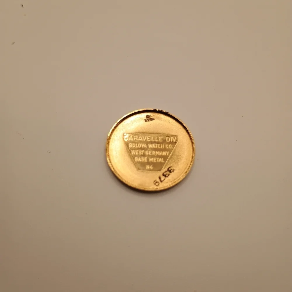 Caravelle Gold Toned Pendant Wind Up Watch